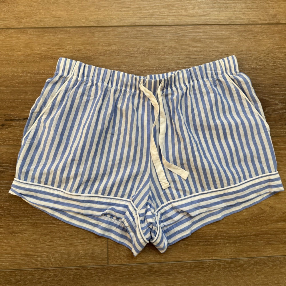 Stars above blue and white striped sleep shorts